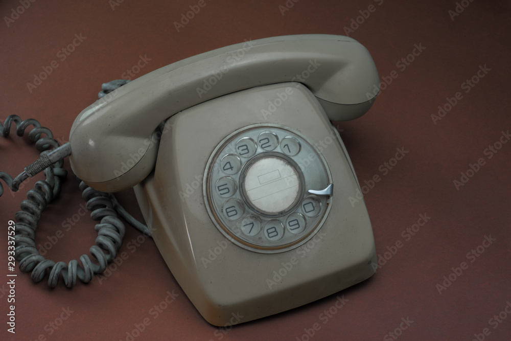 Old telephone with use marks with soft background Old telephone with use marks with soft background