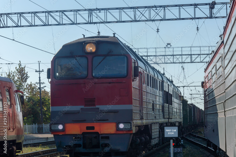 The locomotive drags a heavy freight train. The locomotive drags a heavy freight train.