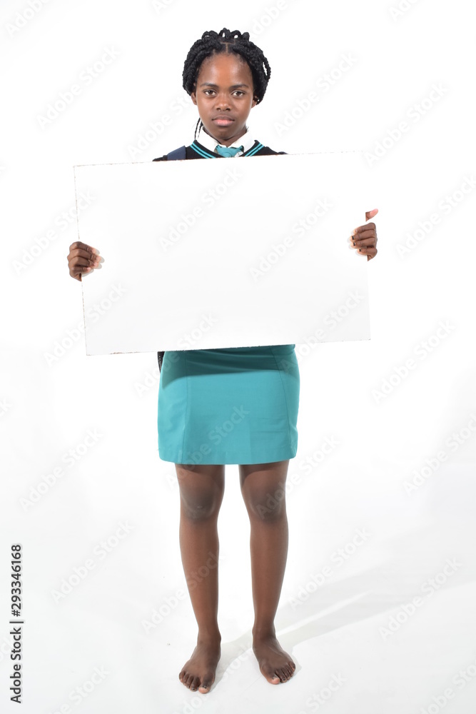 happy beautiful school girl with backpack isolated on white background holding a white board happy beautiful school girl with backpack isolated on white background holding a white board