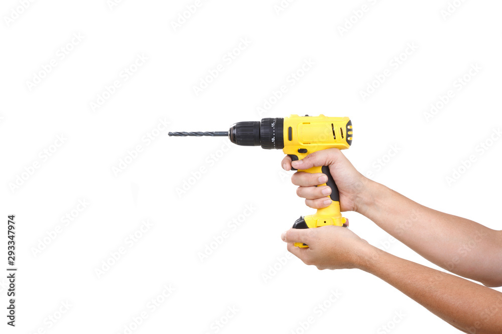 Yellow Cordless drill holding with Hand isolated on white background. COPY SPACE Yellow Cordless drill holding with Hand isolated on white background. COPY SPACE