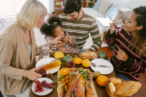 Happy Family Celebrating Thanksgiving Dinner at home .Thanksgiving Celebration tradition concept