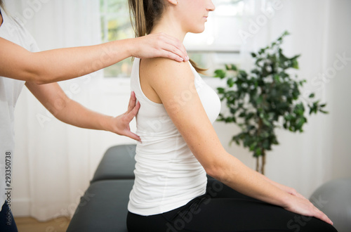 A Modern rehabilitation physiotherapist at work with client