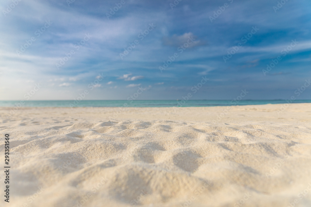 Empty beach landscape. Sea sand sky concept. Calmness and loneliness concept of beach view and horizon under blue sky Empty beach landscape. Sea sand sky concept. Calmness and loneliness concept of beach view and horizon under blue sky