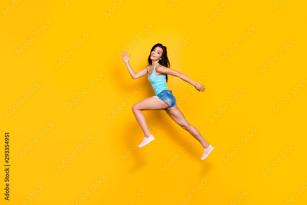 Full length body size photo of youngster of beauty aspiring to come on time for sales at shopping mall being free wearing jeans denim shorts isolated over bright color background