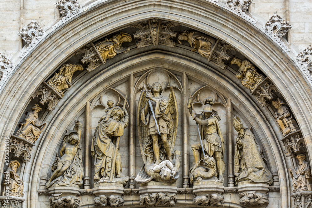 Medieval statues on historical facade of City Hall on Grand Place in Brussels, Belgium Medieval statues on historical facade of City Hall on Grand Place in Brussels, Belgium