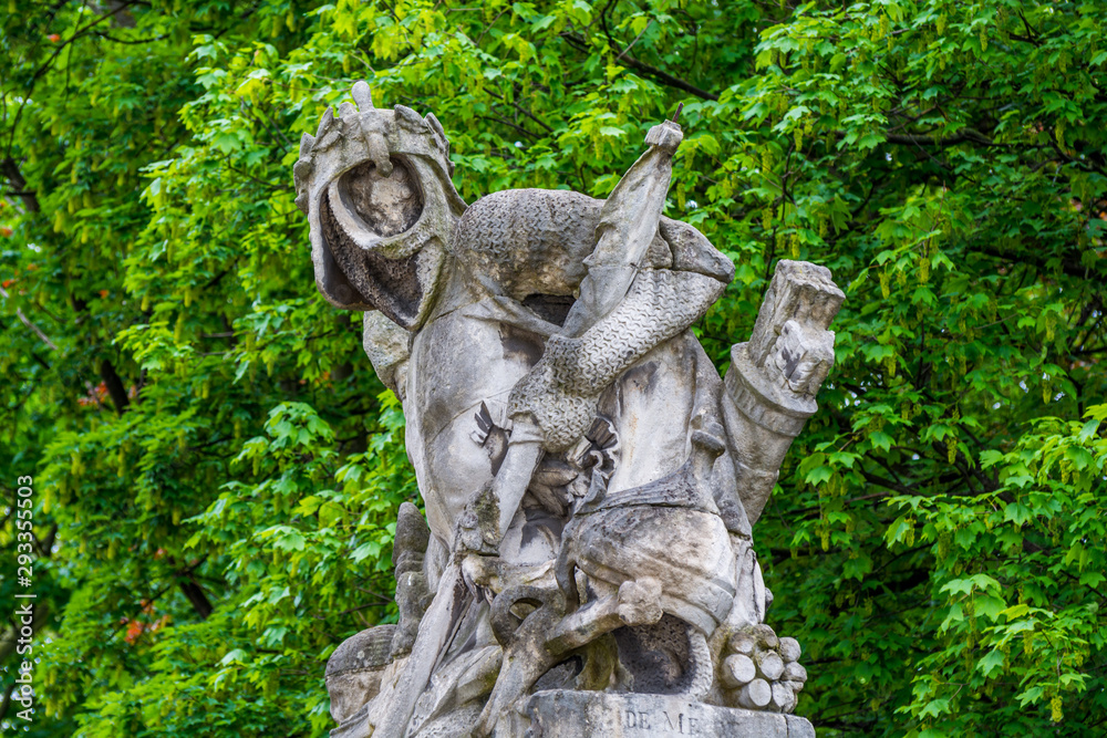The ruined sculpture of Knight on the wall of Royal Palace in Brussels The ruined sculpture of Knight on the wall of Royal Palace in Brussels
