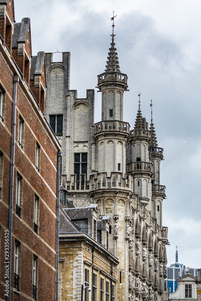 Gothic architecture with rooftops details at the City hall of Brussels, Grand square in downtown of Brussels, Belgium.