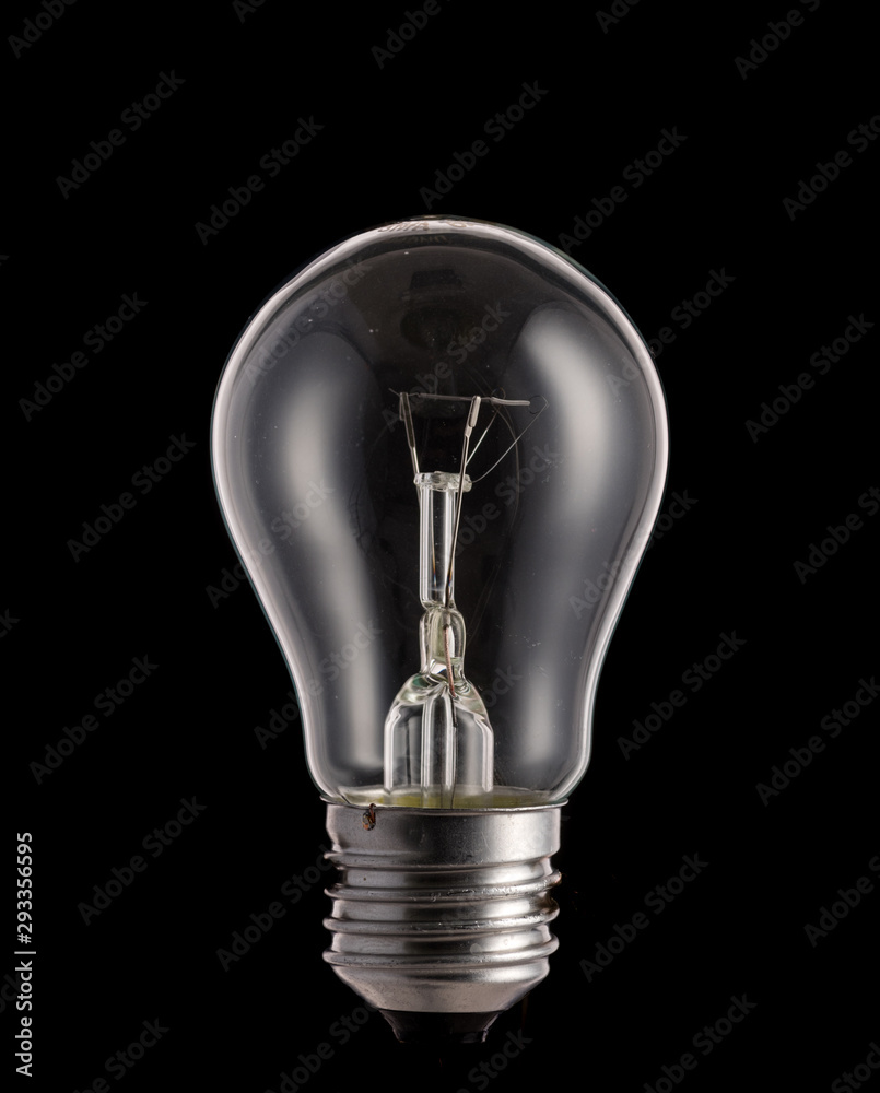 Incandescent lamp a little glow on a black background Incandescent lamp a little glow on a black background