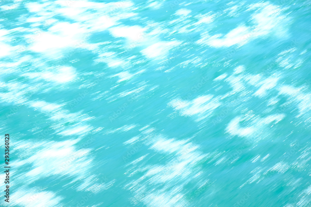 Abstract blurred background, water surface with white spots.