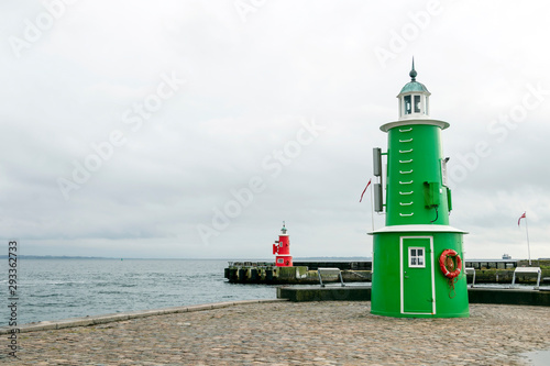 Mole lighthouses are familiar to travelers on Scandlines ferries crossing between Helsingør and Helsingborg, Sweden photo