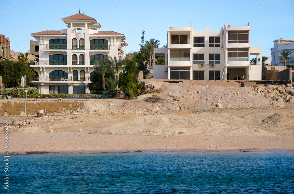 Fototapeta premium View of the coast with the buildings of the Sinai Peninsula of the Red Sea in Sharm el Sheikh