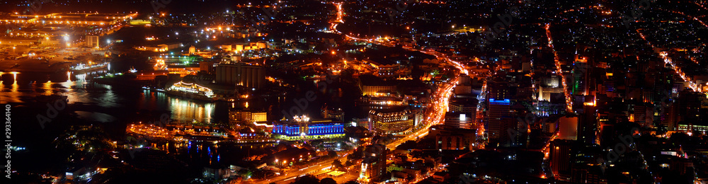 Aerial view of financial coastal district skyline at night