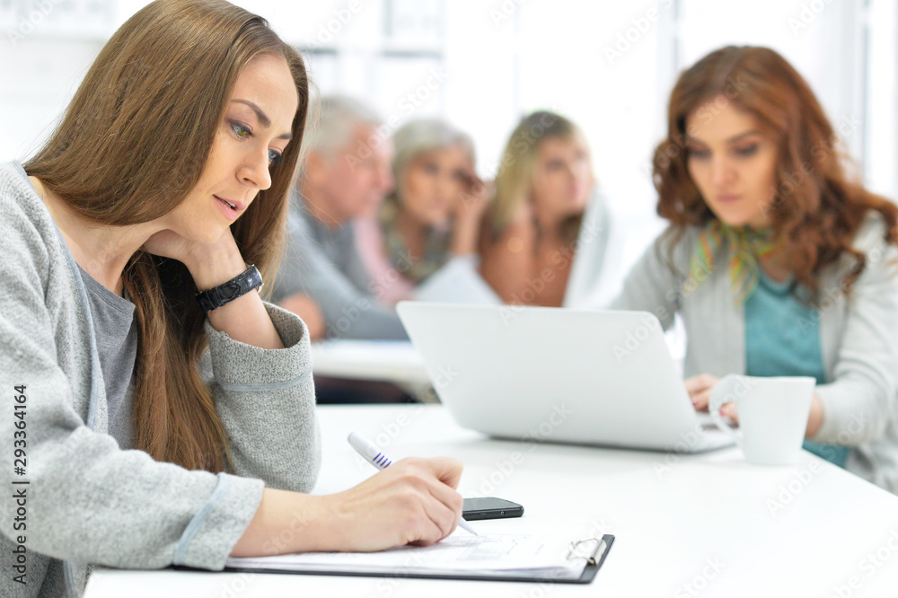 Portrait of group of active business people working Portrait of group of active business people working