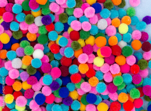 A colorful Pom Pom background