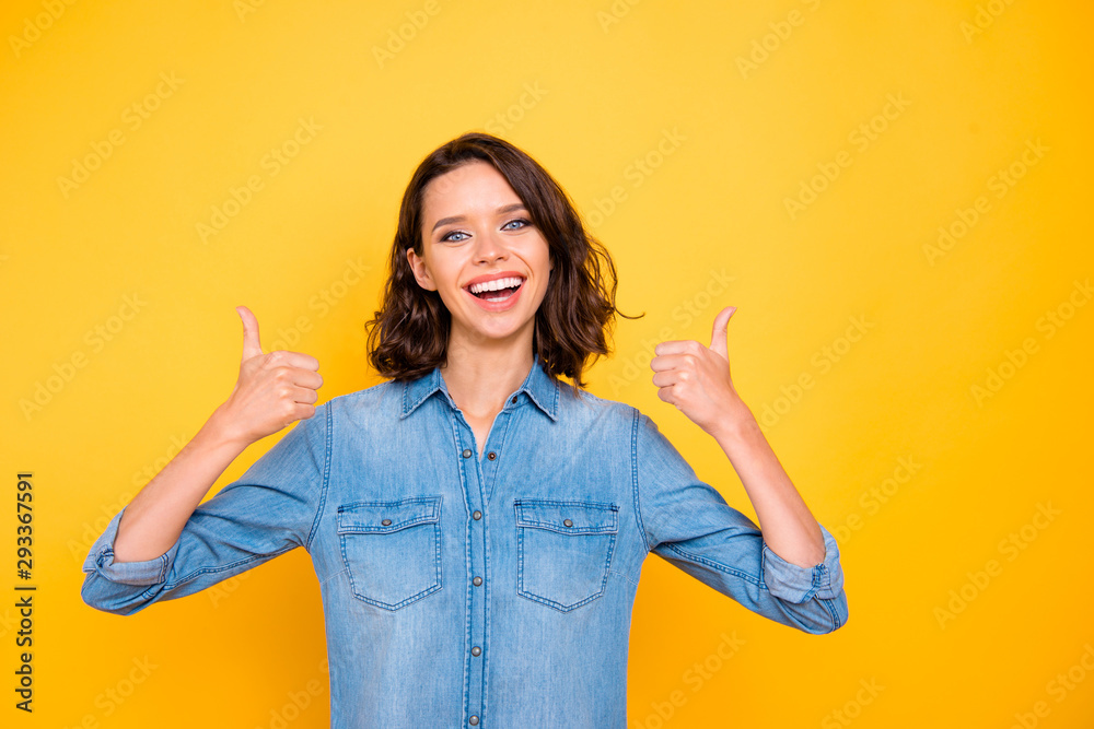 Portrait of cheerful positive promoter feel fun show thumb up advise ads promotion wear youth outfit isolated over yellow color background Portrait of cheerful positive promoter feel fun show thumb up advise ads promotion wear youth outfit isolated over yellow color background