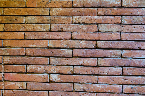 Pattern of grunge red brick wall texture