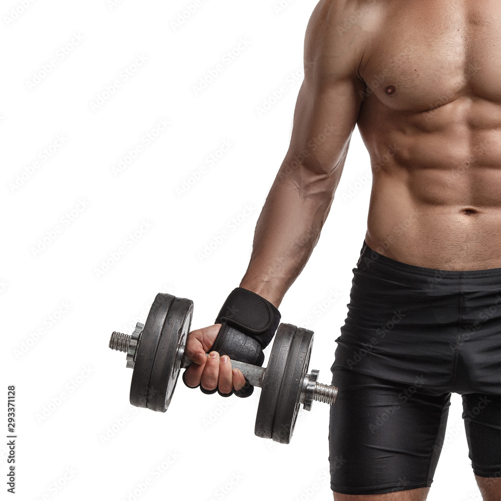 Athletic young man doing exercises with a dumbbell Athletic young man doing exercises with a dumbbell