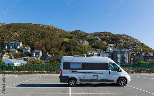 Fotografie, Tablou Motorhome parked in car park Snowdonia National Park Barmouth Wales, beautiful c