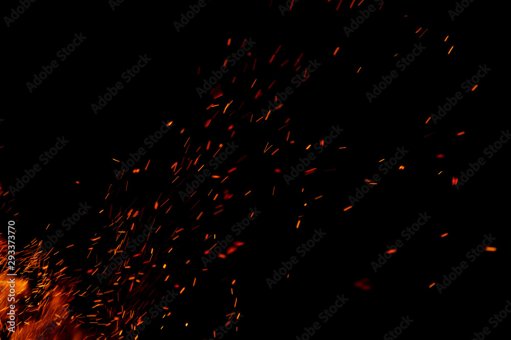 flame of fire with sparks on a black background flame of fire with sparks on a black background