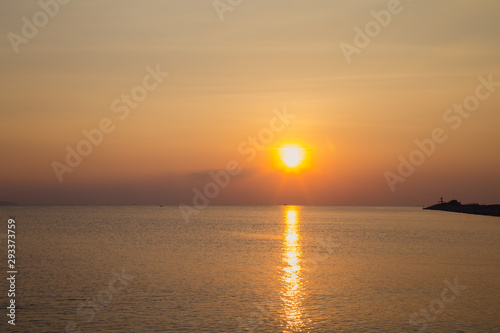 Beautiful sunset over the ocean. Sunrise in the sea © Poramet