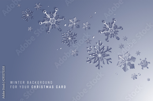 Blue winter background with abstract snowflakes