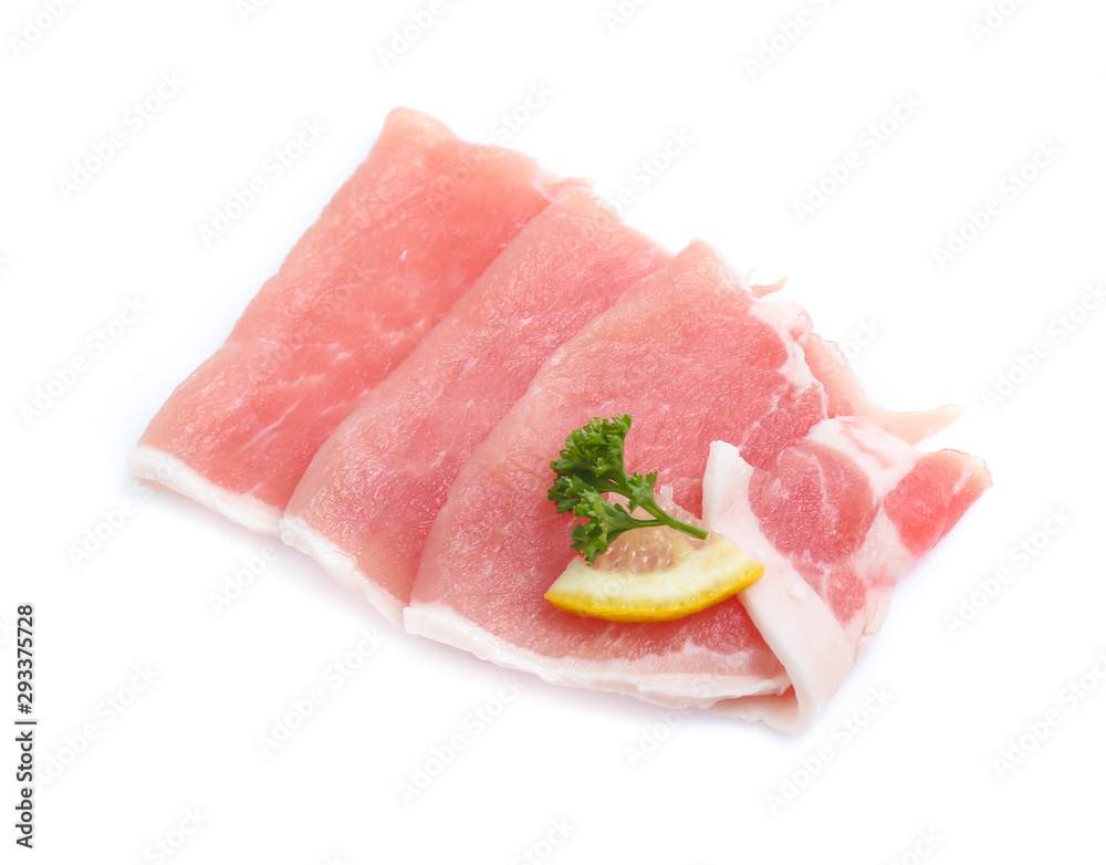 Raw pork meat with parsley herb leaves isolated on white background