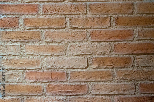 Rough brown brickwork with white seams
