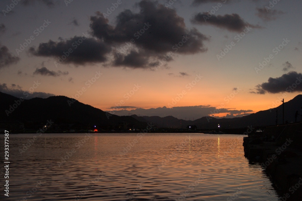 Sunset and angler from the port of Fukui
