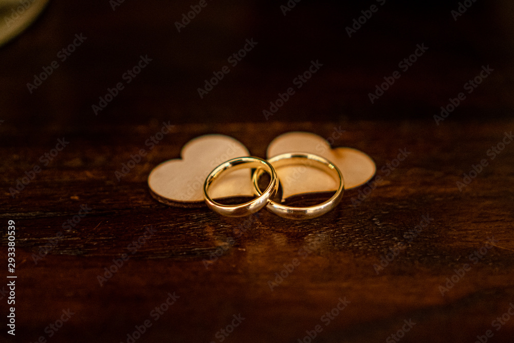 wedding rings on a wooden background wedding rings on a wooden background
