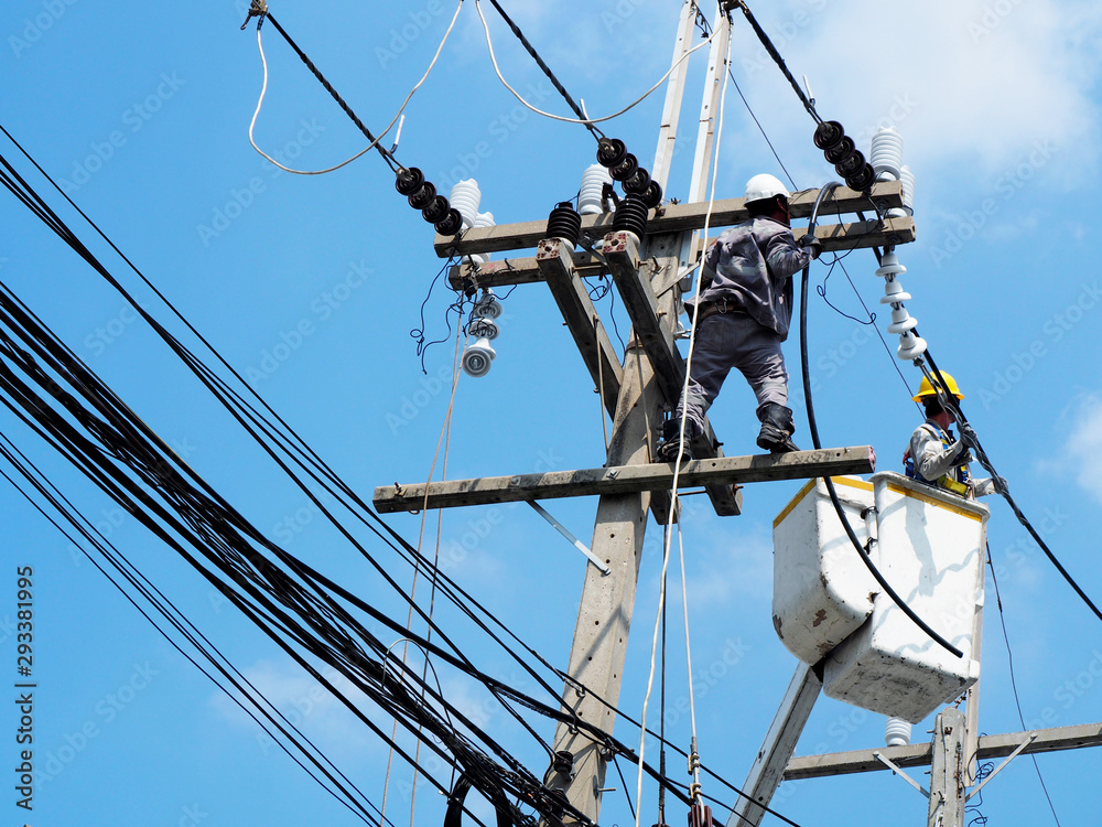 electrician man working at height and dangerous ,high voltage power line maintenance electrician man working at height and dangerous ,high voltage power line maintenance