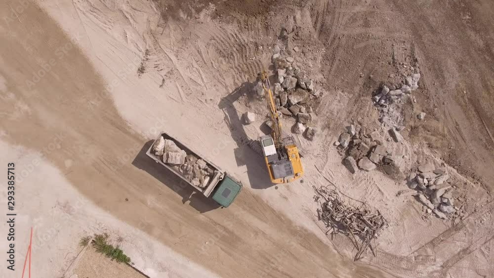 industrial building industry excavator and buldozer in construction site 4K aerial footage