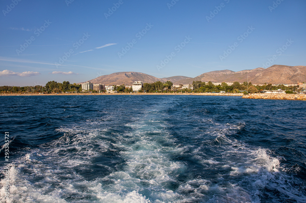 Summer sea vacation travel by yacht leaving the marina of Glyfada, South Attica, Athens, Greece.