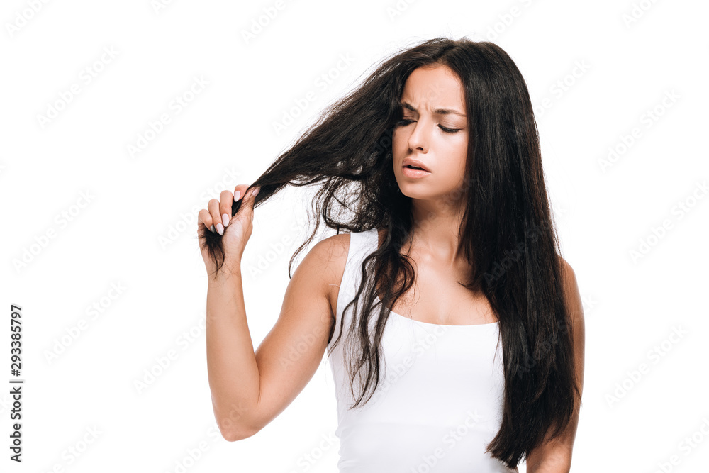 worried brunette beautiful woman with straight and curly hair isolated on white worried brunette beautiful woman with straight and curly hair isolated on white