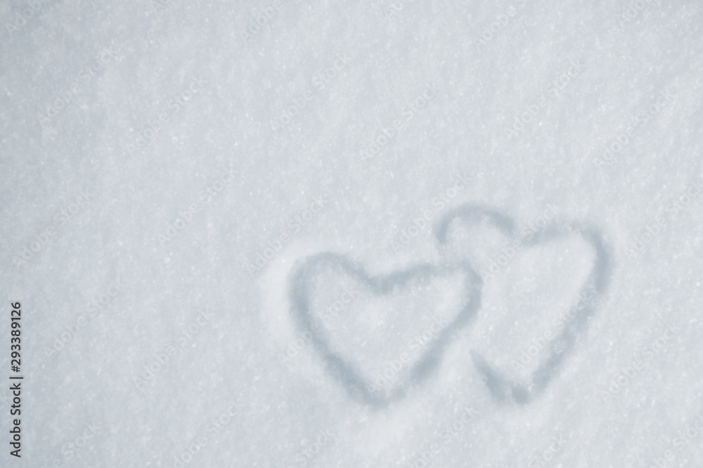 Hearts in snow hearts winter day closeup Hearts in snow hearts winter day closeup
