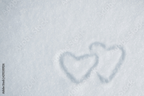 Hearts in snow hearts winter day closeup
