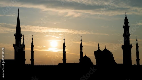 Medina: Al Masjid an Nabawi, Islamic Prophet's Muhammad Mosque, or Nabi Mosque, Time Lapse at Sunrise with Colorful Clouds, Madinah, Saudi Arabia photo