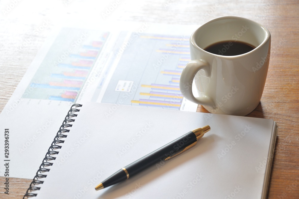 note paper and graph paper in business concept note paper and graph paper in business concept