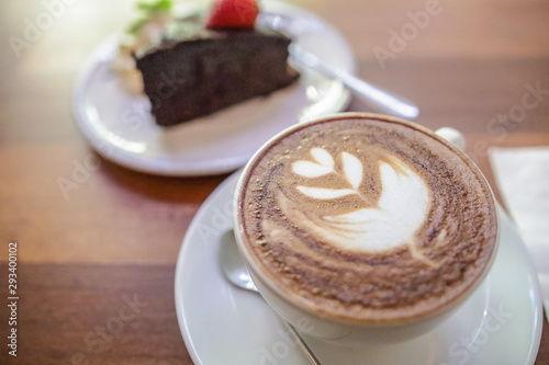Cappuccino coffee and strawberry cake