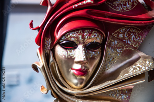 Large carnival mask depicting a woman. Group Of Vintage Venetian Carnival Masks.