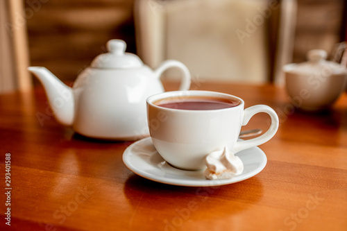 Hot tea in white cup