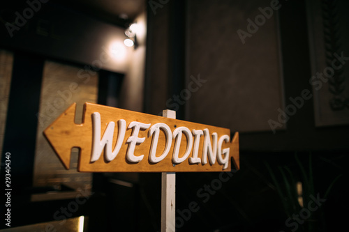 Wedding decor. Wooden plaque with the inscription Wedding