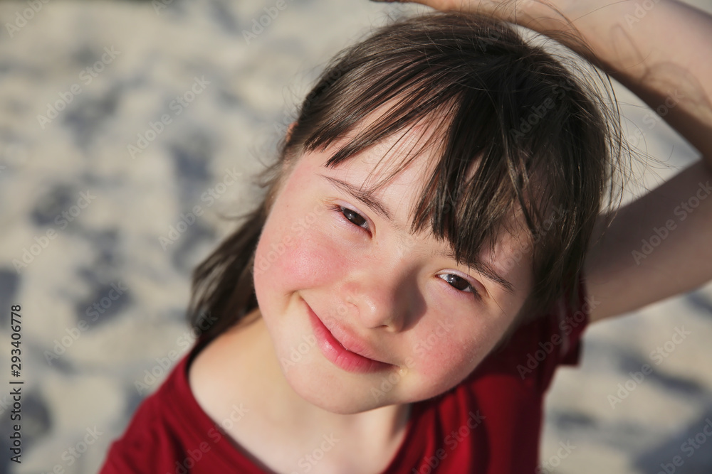 Portrait of girl smiling in the beach
