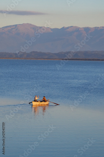 A litte boat and the fishermen on the lake Paliastomi. Poti. Georgia.
