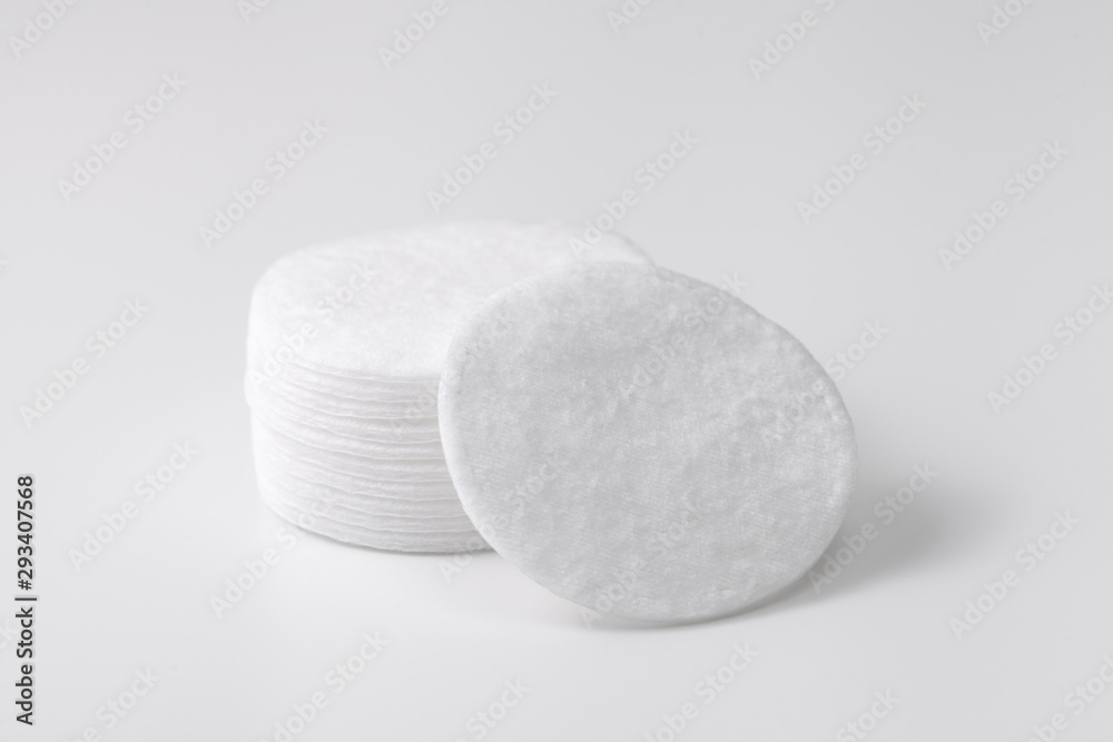 A stack of cotton pads and a number of separate discs deployed on the camera A stack of cotton pads and a number of separate discs deployed on the camera