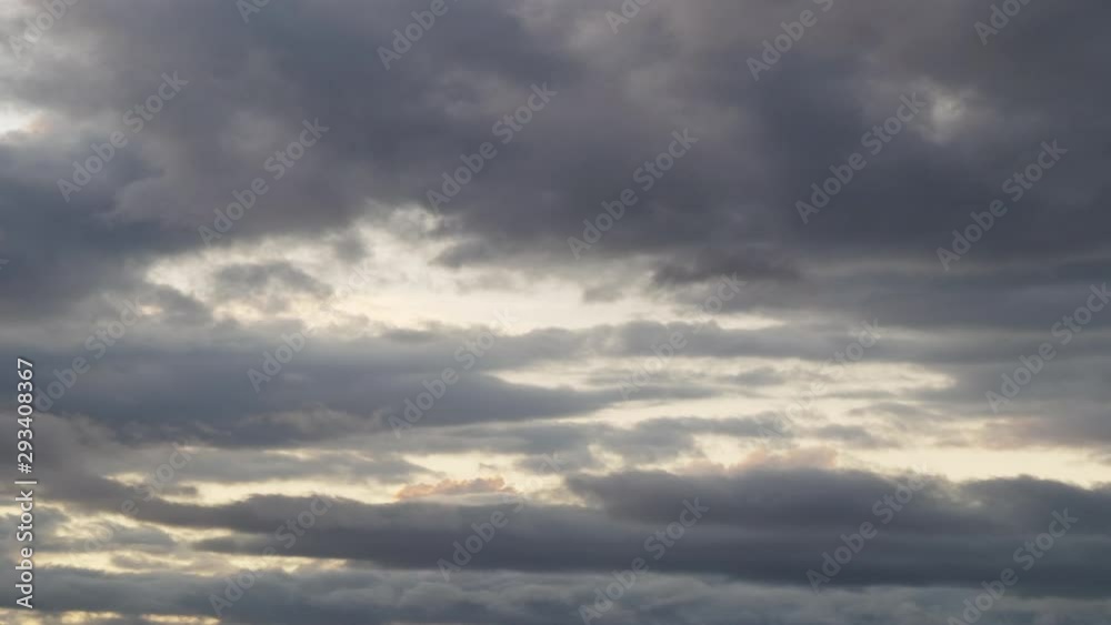 A timelpase of dark clouds forming with a flock of birds. A timelpase of dark clouds forming with a flock of birds.