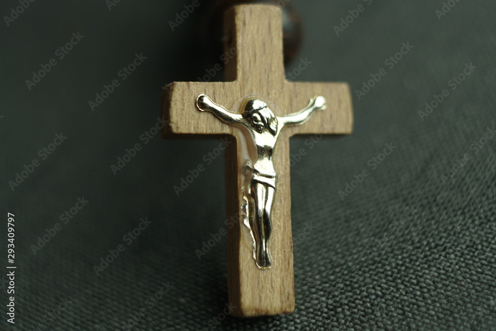 old wooden crucifix with figure of jesus
