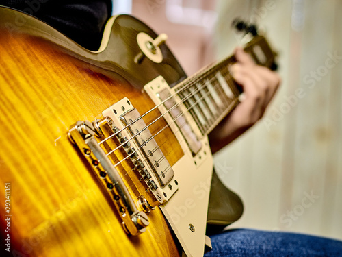 close-up electric guitar, playing the guitar, music for the soul