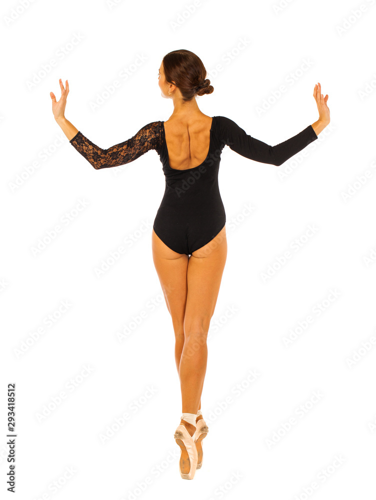 Portrait of a young beautiful ballerina in black ballet suit, isolated on white background