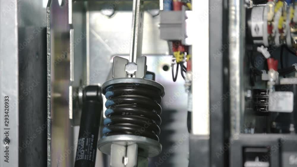 High voltage mains fuse switch during overload. Spring compression ...