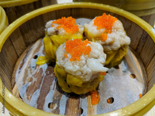 Shumai is a type of traditional Chinese dumpling, originating from Huhhot. In Cantonese cuisine, it is usually served as a dim sum snack. photo